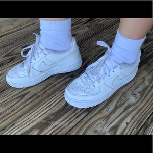 Low top white Air Force 1s